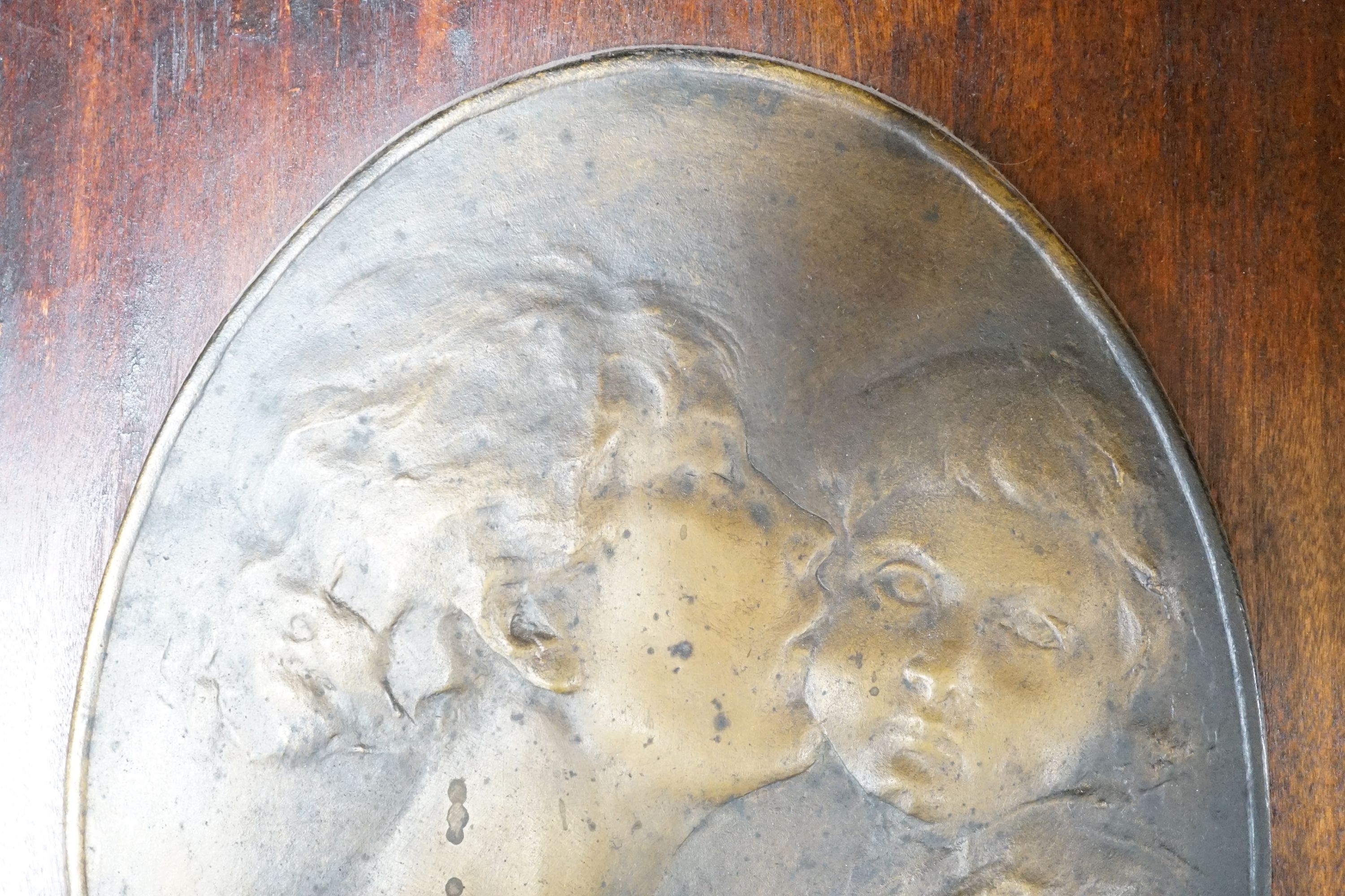 Robert Greter - oval relief plaque of a mother and child, mounted on board, plaque 26x19cm